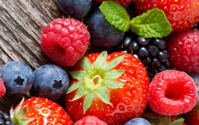 Berries of raspberries, strawberries, blackberries and blueberries close-up