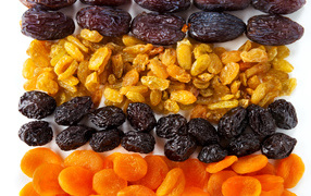 Raisins, prunes, dried apricots and dates on the table
