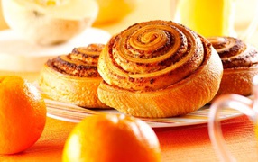 Appetizing fresh rolls with oranges