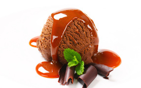 A chocolate ice cream ball with jam on a white background