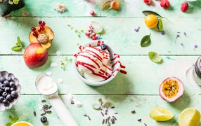 Balls of cream ice cream with berries and fruits