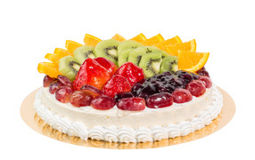 Beautiful birthday cake with berries on a white background