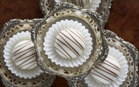 Beautiful festive cupcakes in silverware