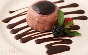 Chocolate dessert with blueberries and raspberries