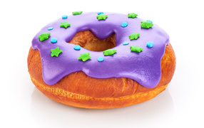 Donut with purple icing on a white background