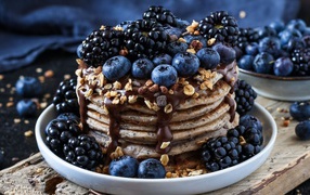 Pancakes with blueberries and blackberries