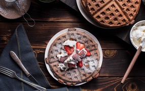 Sweet wafers with cream and strawberry berries