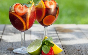 Two glasses of fruit cocktail on the table