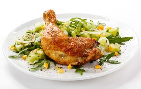 Chicken leg with salad on white background