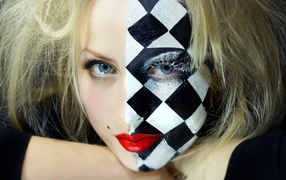 Blue-eyed blonde with unusual make-up on her face