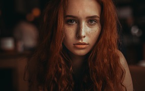 Red-haired girl with beautiful eyes