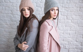 Two young girls in warm hats