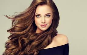 Young blue-eyed girl with beautiful long hair