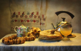 Festive table with pancakes and donuts for the holiday Maslenitsa