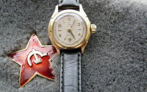 Наградные часы и красная звезда на день Победы 9 мая