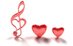 Два красных сердца и нота на белом фоне