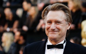 Американский актер Билл Пуллман в костюме