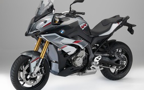 Gray motorcycle BMW S1000 XR on a gray background