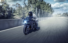 Motorcyclist on the motorcycle Kawasaki Ninja H2, 2019 on the race track