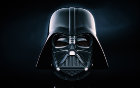 Лицо в маске Дарт Вейдер на черном фоне