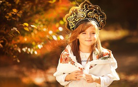 Little beautiful girl in kokoshnik