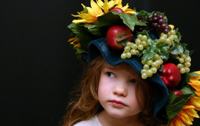 Little girl in an unusual hat