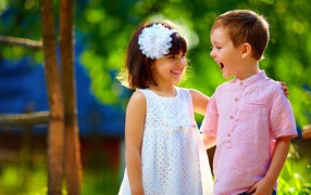 Little smiling boy and girl