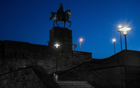 Monument to the German Emperor Wilhelm I in the light of the night lights, Cologne. Germany