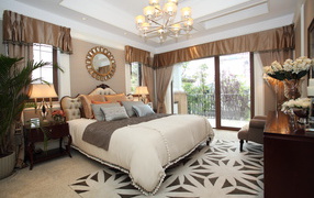 Beautiful bedroom with king size bed and balcony