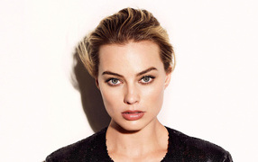 Beautiful blonde, actress Margot Robbie on a white background