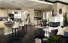 Красивая гостинная с кухней в пастельных тонах 