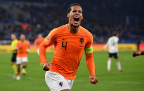 Dutch footballer Virgil van Dijk screaming on the pitch