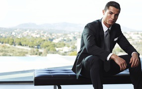 Popular footballer Cristiano Ronaldo in a suit