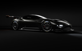 Black sports car Aston Martin Vulcan on a gray background