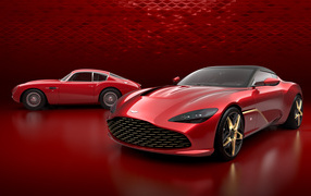Красный дорогой автомобиль Aston Martin DBS GT Zagato 2019 года на красном фоне