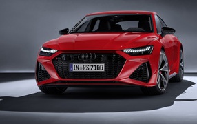 Red car Audi RS 7 Sportback 2019 on a gray background