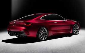 Бордовый автомобиль BMW Concept 4 2019 года вид сзади
