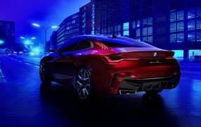Красный автомобиль BMW Concept 4 2019 года в городе