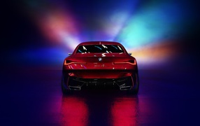 Красный автомобиль BMW Concept 4 2019 года вид сзади