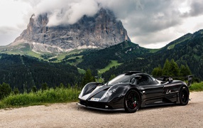 Black sports car Pagani Zonda on the background of the mountain