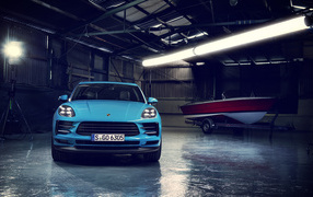 Blue 2019 Porsche Macan in the garage