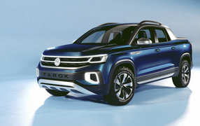 Синий внедорожник Volkswagen Tarok Concept 2019 года на голубом фоне