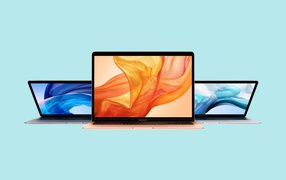 Thin MacBook Air MacBooks on a Blue Background