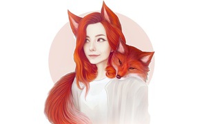 Beautiful red-haired girl with a fox on her neck