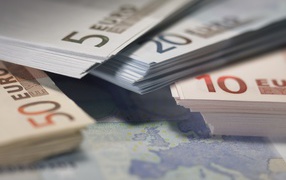 Bundles of euro bills close up