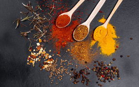 Fragrant spices on a gray surface