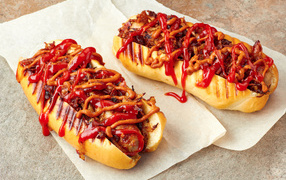 Grilled hotdogs with sausages and sauce