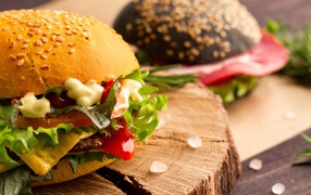 Hamburger on a wooden board closeup