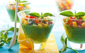 Smoothies with vegetables in glasses on the table