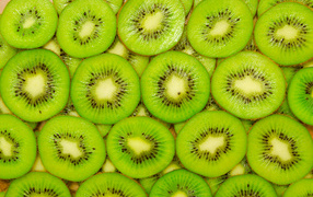 Фон из сочных кусочков киви крупным планом